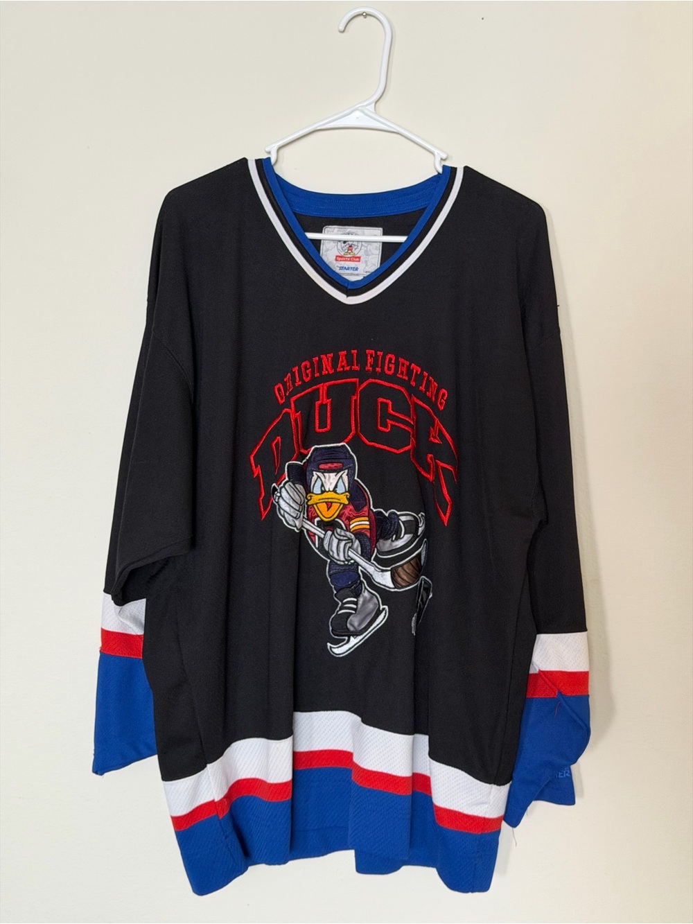 STARTER Black Hockey Jersey with Red & Blue Accents and Ducks Graphic